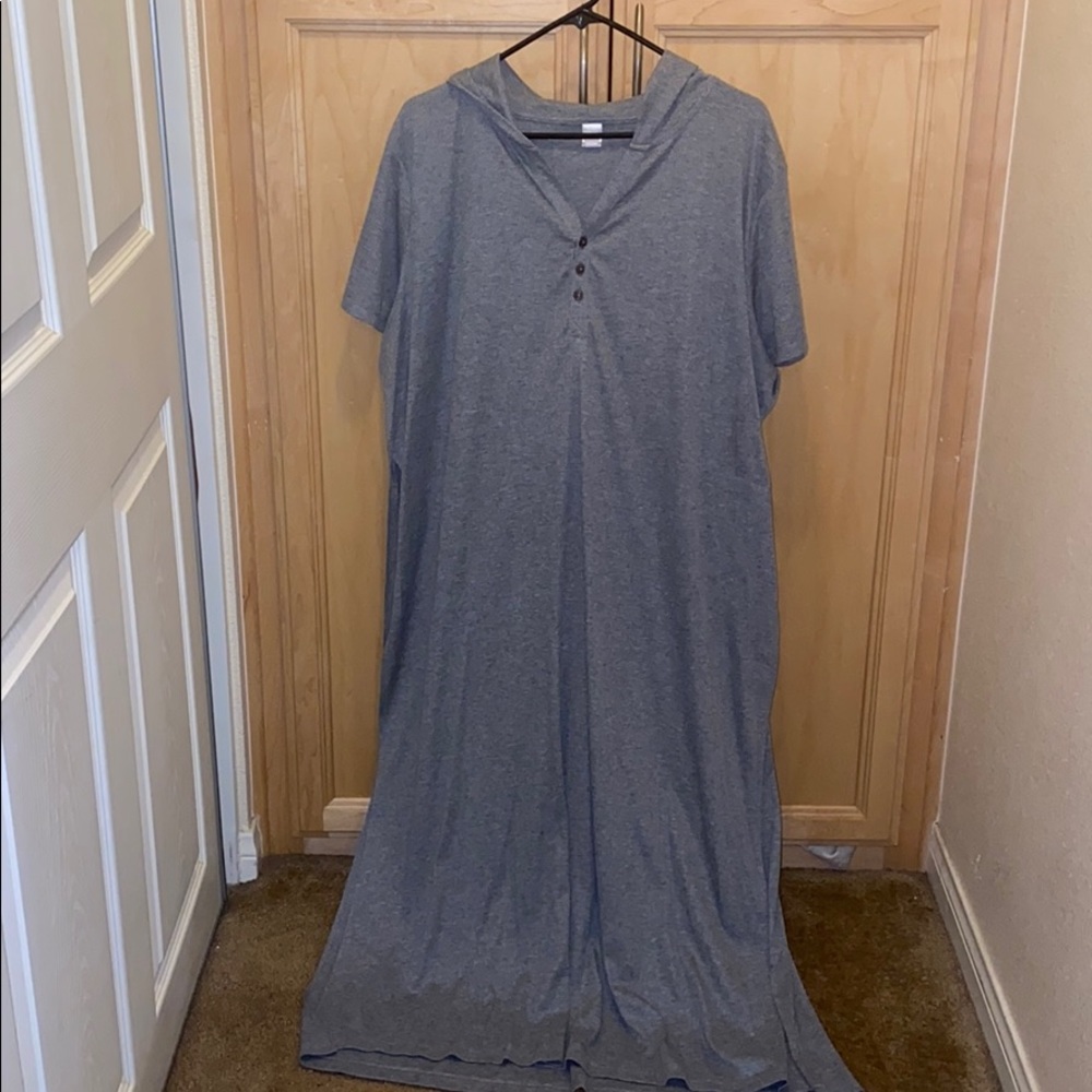 Long shirt. Sides slit open.